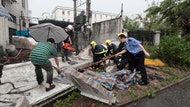 Violent thunderstorms have lashed parts of China's southern industrial heartland of Guangdong province, leaving  people dead and scores injured.